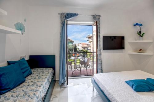 A bed or beds in a room at Maison Marienne - Deluxe B&B