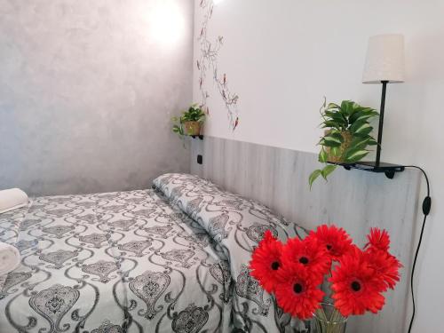 Ένα ή περισσότερα κρεβάτια σε δωμάτιο στο B&B Villa Molinari Restaurant e Baby Park