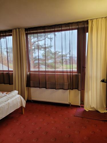 Postel nebo postele na pokoji v ubytování Complex Brashlyan