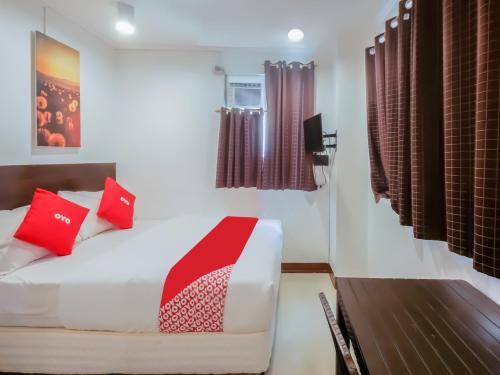 Vuode tai vuoteita majoituspaikassa Super OYO 856 City Stay Inns Slex Makati