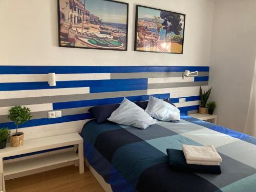 Postel nebo postele na pokoji v ubytování Apartamento con WiFi y Aire acondicionado en Pals Playa