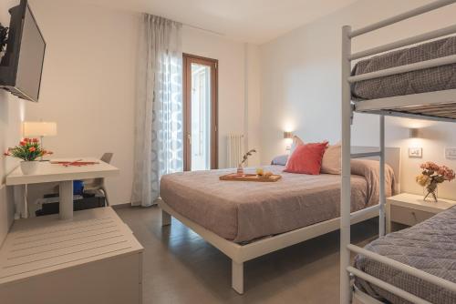 Postel nebo postele na pokoji v ubytování I GELSI B&B