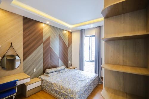 Ένα ή περισσότερα κρεβάτια σε δωμάτιο στο Kenpi Garden Homestay - NGUYÊN CĂN, đậu nhiều ô tô
