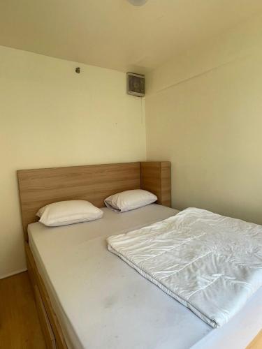 En eller flere senge i et værelse på Moagi Stay Geranium