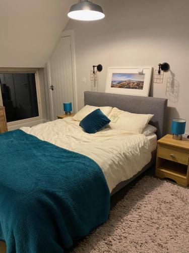 Postel nebo postele na pokoji v ubytování Dream Cottage