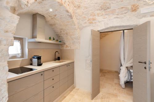 Kúpeľňa v ubytovaní Suite21 - The Trulli Experience