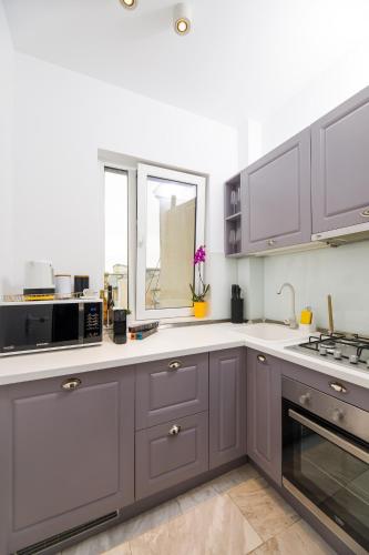 Køkken eller tekøkken på Bucharest Central Apartment Inter