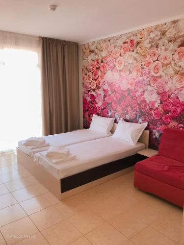 Katil atau katil-katil dalam bilik di Arapya Resort