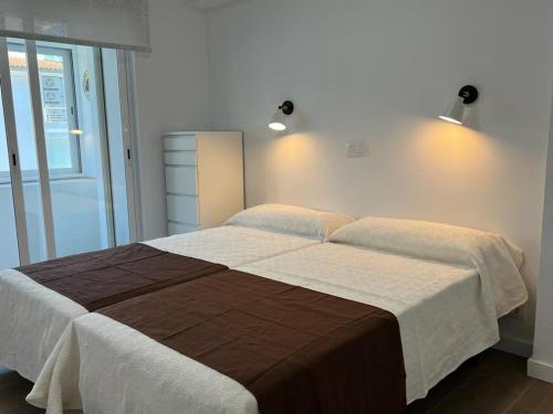 Posteľ alebo postele v izbe v ubytovaní Cap Negret 40