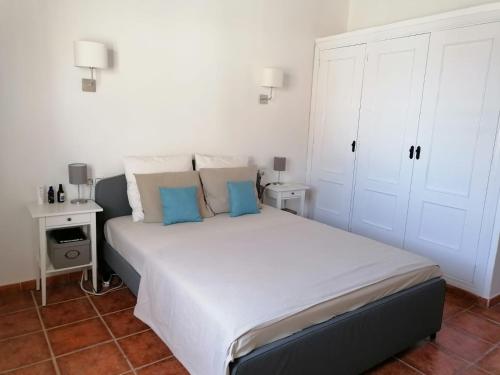 En eller flere senger på et rom på Villa Andalouse Roxane