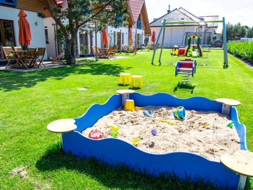 Zahrada ubytování Domki Całoroczne KLIF Ustka - Nowoczesne dwupoziomowe domki nad morzem