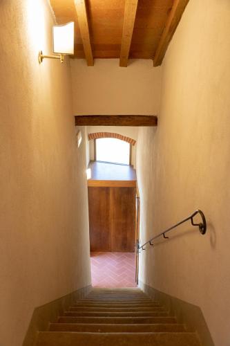 a stairway leading to a building with a window at Agriturismo I Bonsi in Reggello