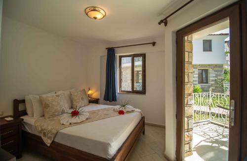 Postel nebo postele na pokoji v ubytování Turay Hotel