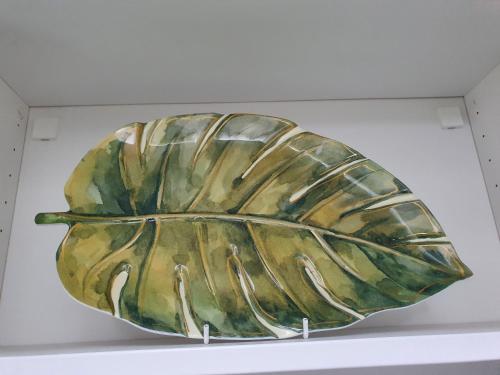 a large bowl is sitting on a shelf at Grosvenor House Hotel in Torquay