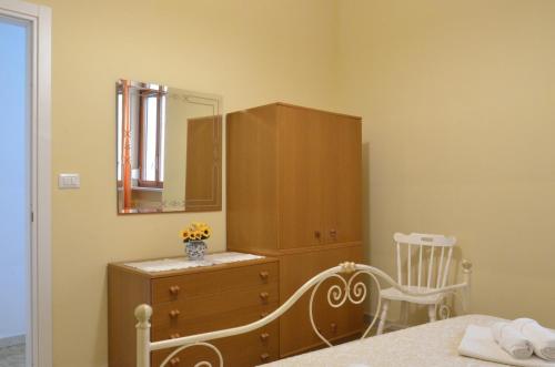 A bed or beds in a room at MY SWEET HOME - SIRACUSA