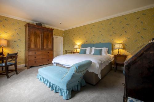 Ένα ή περισσότερα κρεβάτια σε δωμάτιο στο Upper Helmsley Hall