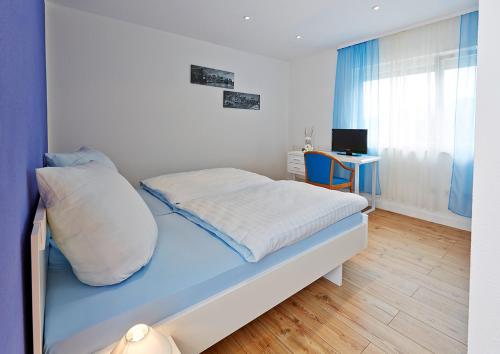 Ein Bett oder Betten in einem Zimmer der Unterkunft Hotel Restaurant Da Vinci