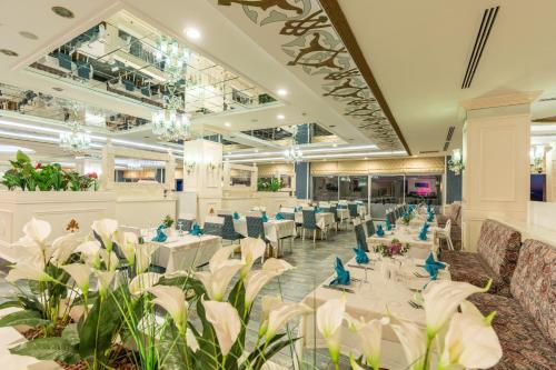 Adenya Hotel & Resort Halal All Inclusiveにあるレストランまたは飲食店