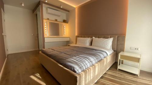 Katil atau katil-katil dalam bilik di Tirana Primo Apartment