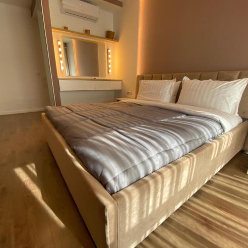 Katil atau katil-katil dalam bilik di Tirana Primo Apartment