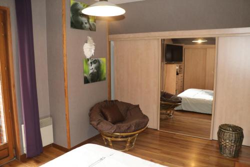 Ein Bett oder Betten in einem Zimmer der Unterkunft PAVILLON TOUT CONFORT EN CAMPAGNE