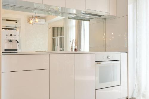 Kuchyň nebo kuchyňský kout v ubytování Fantasy studio- Spa n Pools beach resort