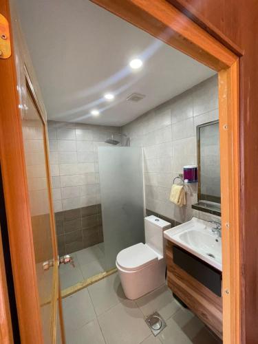 a bathroom with a toilet and a sink at ببالز Ajloun عش وسط الطبيعة - ِAjloun Bubbles Live amid nature in Ajloun