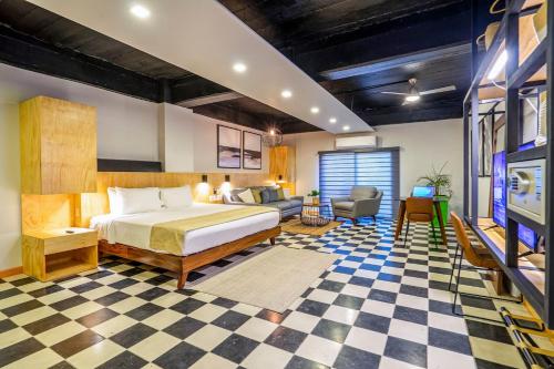 Postel nebo postele na pokoji v ubytování Joint Boutique Hotel