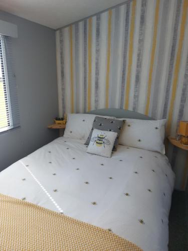 a bed with a pillow on it in a bedroom at Jock's Place in Whitley Bay