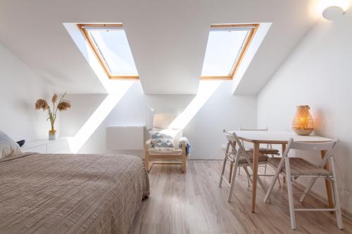 Ένα ή περισσότερα κρεβάτια σε δωμάτιο στο Lovely Nida Studio