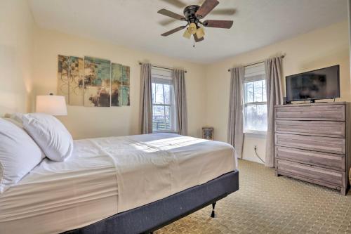 a bedroom with a bed and a ceiling fan at Charming East Bernstadt Retreat Less Than 6 Acre Farm! in East Bernstadt