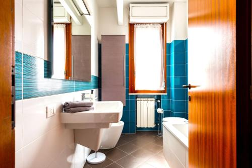 Hostly - Family Home Cisanello tesisinde bir banyo