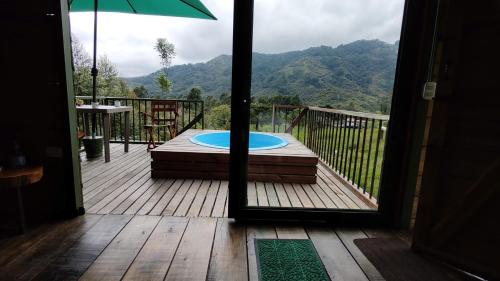 a view of a deck with a frisbee on it at Ecohotel Pinohermoso Reserva Natural in Salento