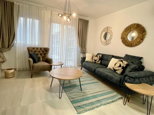 Area tempat duduk di Sweetness Apartment By the Sea