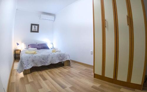 Postel nebo postele na pokoji v ubytování Holiday House JASNICA