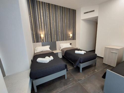 Ein Bett oder Betten in einem Zimmer der Unterkunft Incantos charme B&B
