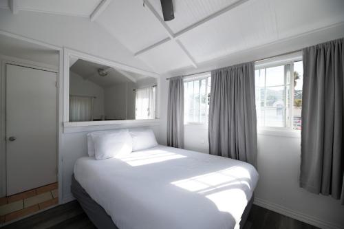 Tempat tidur dalam kamar di Hermosa Hotel