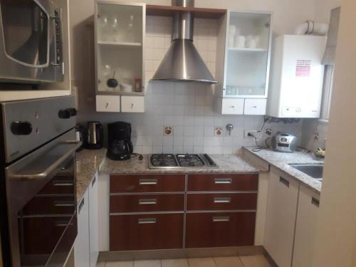 Køkken eller tekøkken på Pinamar Frente al Mar