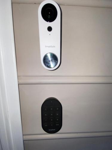a remote control sticking out of a drawer at Modern 3-bedroom, big fence yard, Pets stay free in Durham