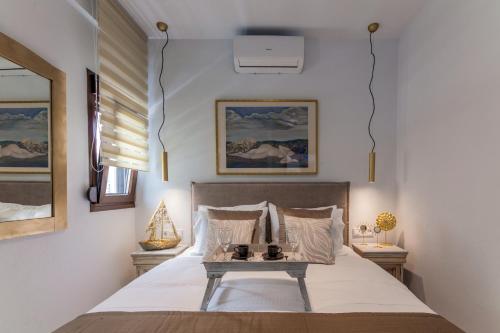 Posteľ alebo postele v izbe v ubytovaní Estia Apartment