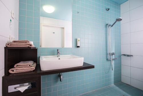 Koupelna v ubytování Hotel Grenzfall