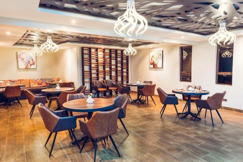 Restoran või mõni muu söögikoht majutusasutuses OSOTUA LUXURY RESORT by ICON
