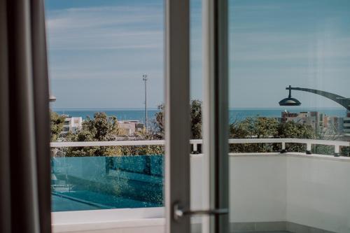 The swimming pool at or close to Suite Donna Edwige by MONHOLIDAY