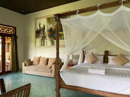 Letto o letti in una camera di Sawah Indah Villa