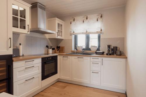 Kuchyň nebo kuchyňský kout v ubytování Asten-Chalets