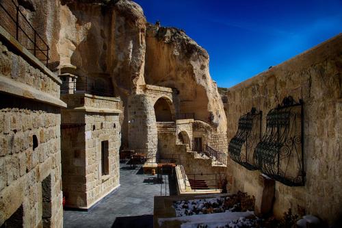 an alleyway in an old stone building at 1811 Cave Hotel in Nevşehir