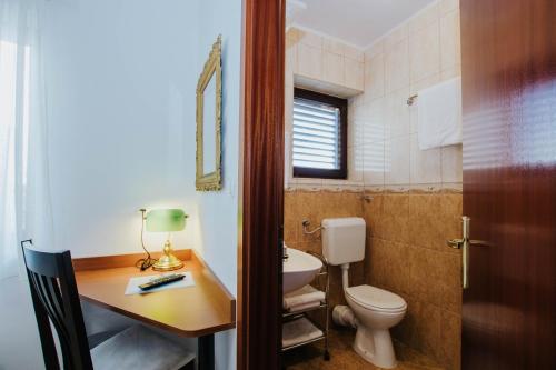 Koupelna v ubytování Hotel Vila Tina