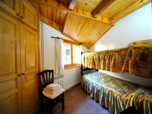 Posteľ alebo postele v izbe v ubytovaní Apartament L'àtic