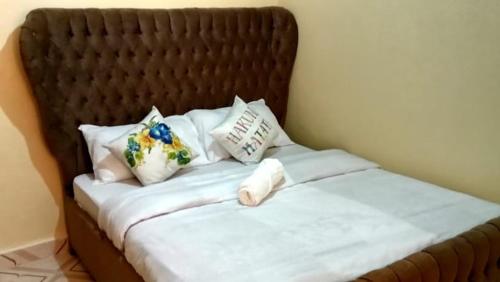 Postel nebo postele na pokoji v ubytování Naka homes