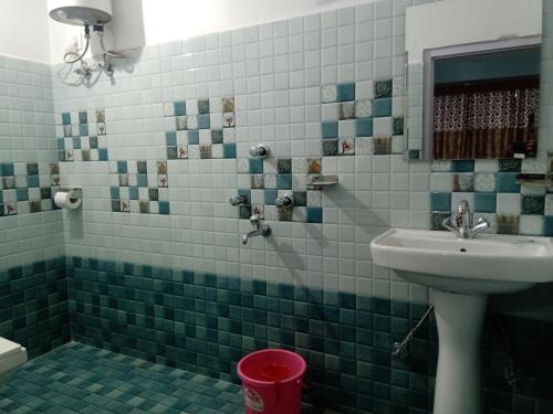 Ванная комната в Mandavya homestay